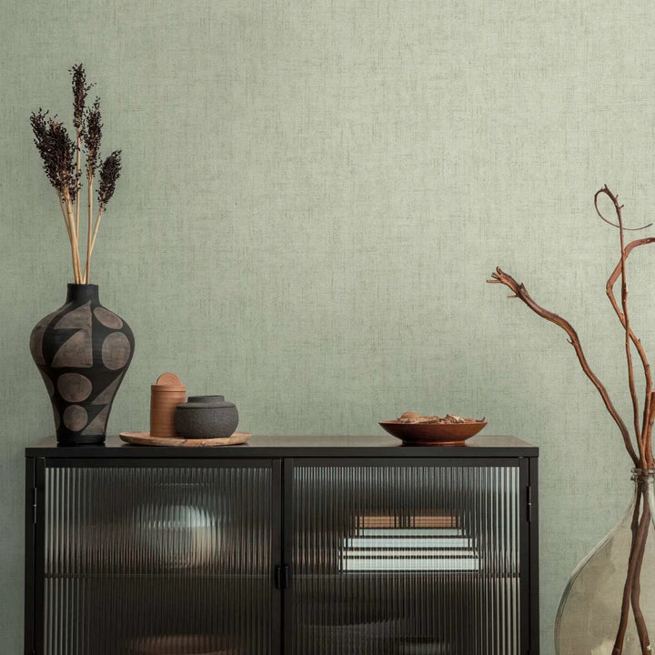 Plain non-woven wallpaper in light sage green with a fine linen texture - 3007656