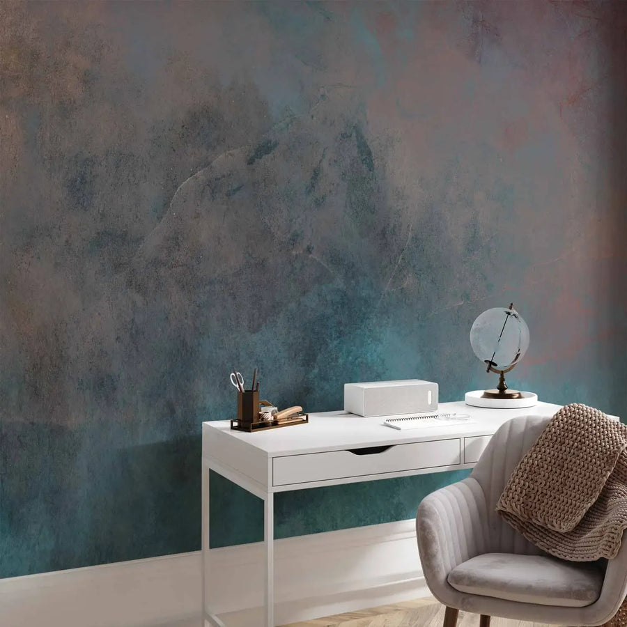 Abstract photo wallpaper with a painterly decorative plaster texture, where dark blue, turquoise, gray, and dusty pink tones flow together, creating a smoky effect.