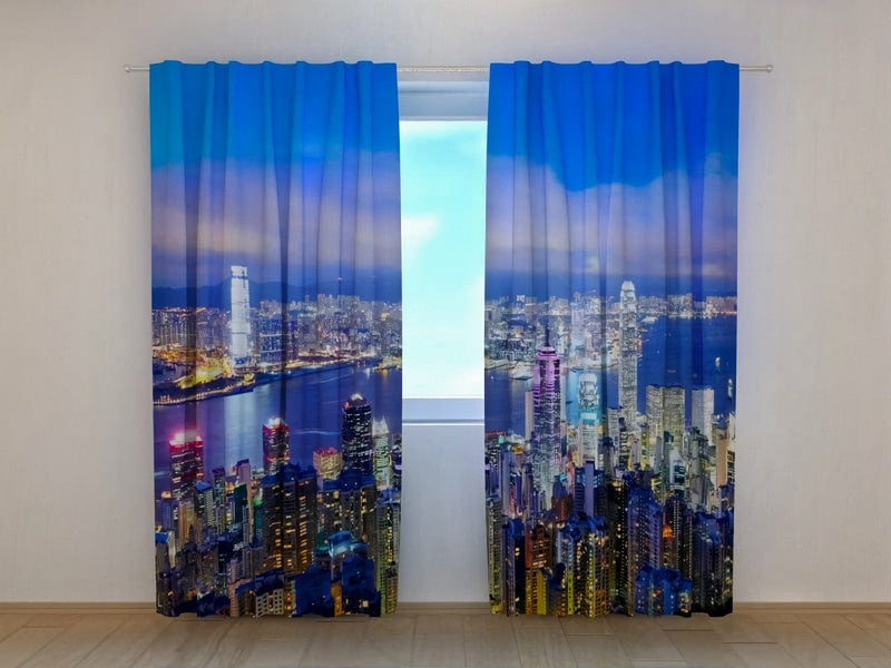 Curtains with Hong Kong Panorama will give the room a metropolitan mood on Tapetenshop.lv