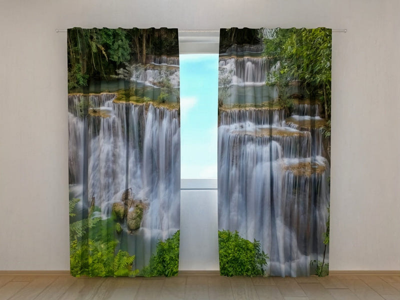 Curtains with the beautiful Kanchaburi waterfall create a natural motif at home Tapetenshop.lv