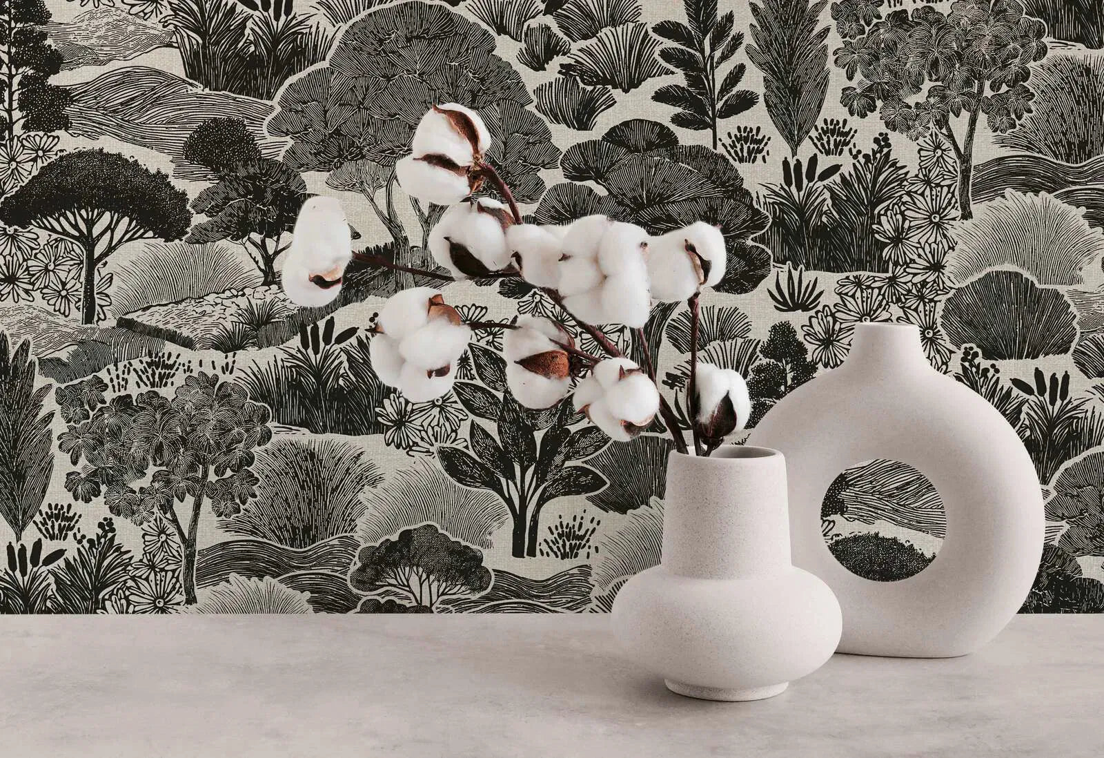 Black and white decorative wallpaper with tree landscape in a classic living room interior. SKU: 3012455, AS Creation.