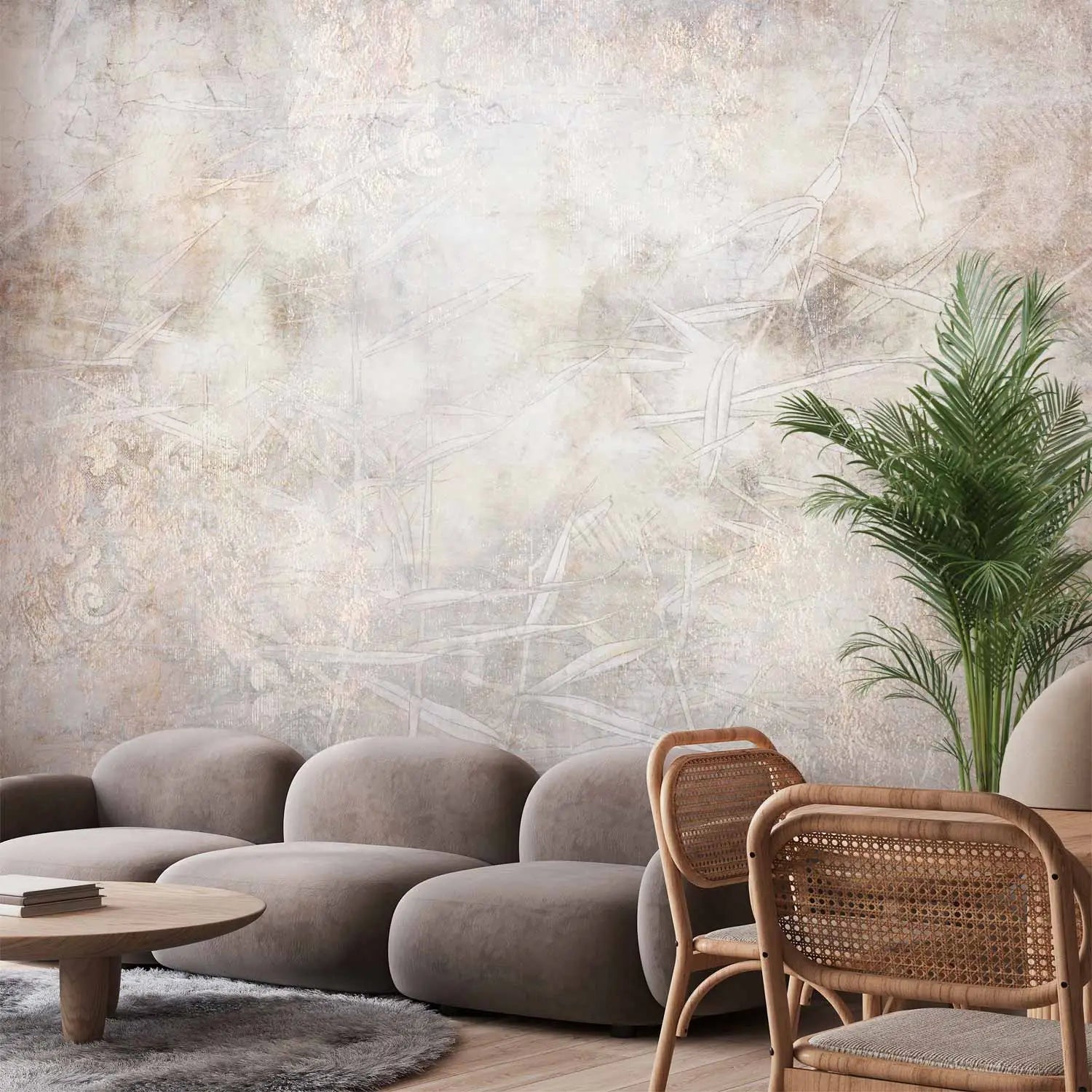 Wall mural with a vintage-style textured background in shades of gray and beige, complemented by delicate, translucent bamboo leaf motifs and an artistically aged plaster effect.