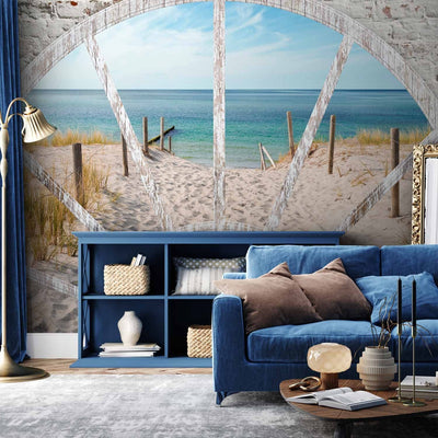 Fototapetes - Skats no loga - ainava ar jūru un pludmali ar akmens arku, 62448 G-ART