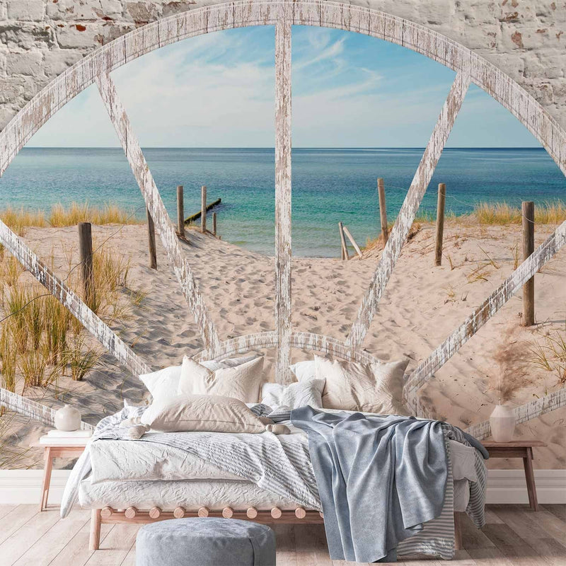 Fototapetes - Skats no loga - ainava ar jūru un pludmali ar akmens arku, 62448 G-ART