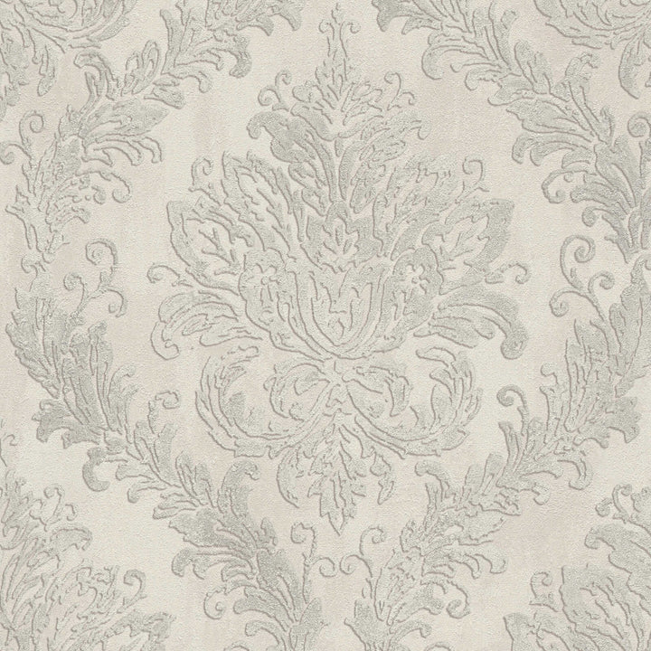 Light gray wallpaper with a classic damask ornament, close-up