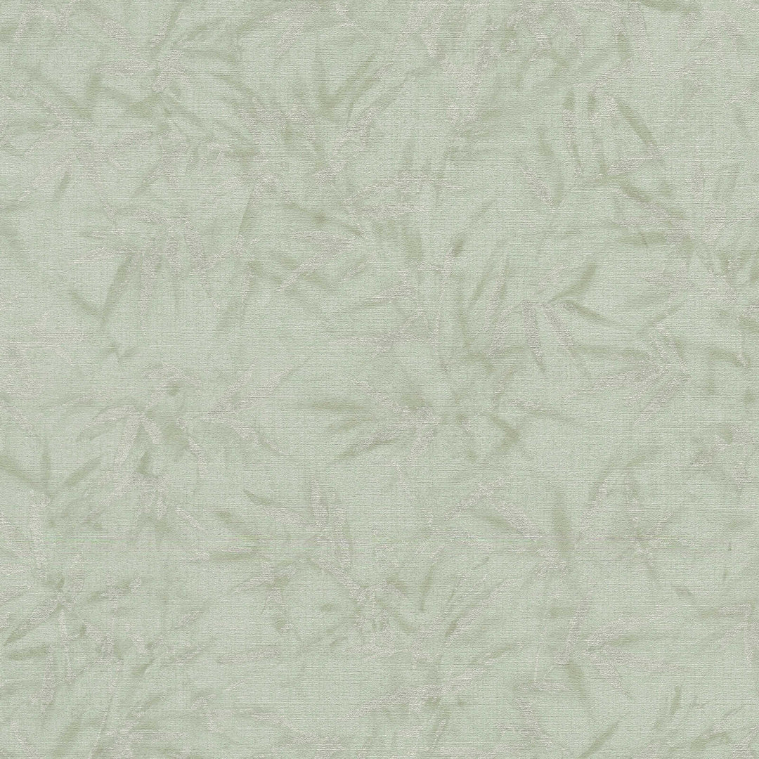 Light green wallpaper with a delicate bamboo leaf pattern, close-up