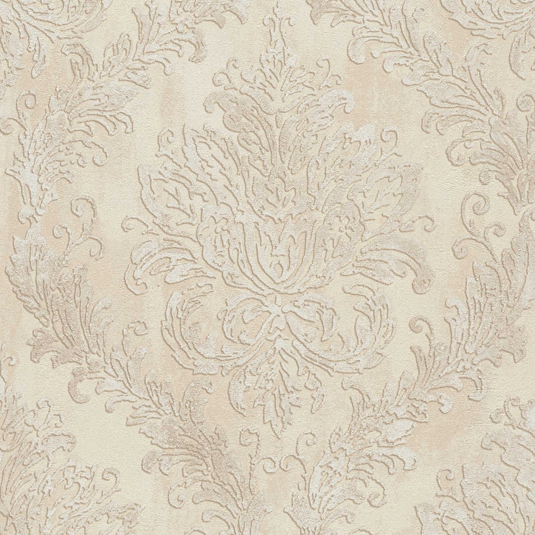 Light beige wallpaper with a classic damask ornament, close-up