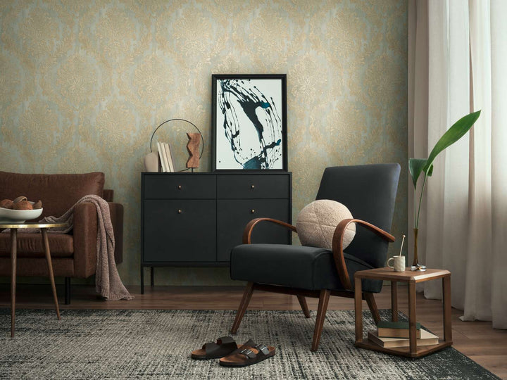 Light greenish damask pattern wallpaper in a living room interior with a black lounge chair, black dresser, and brown wood floor with a rug