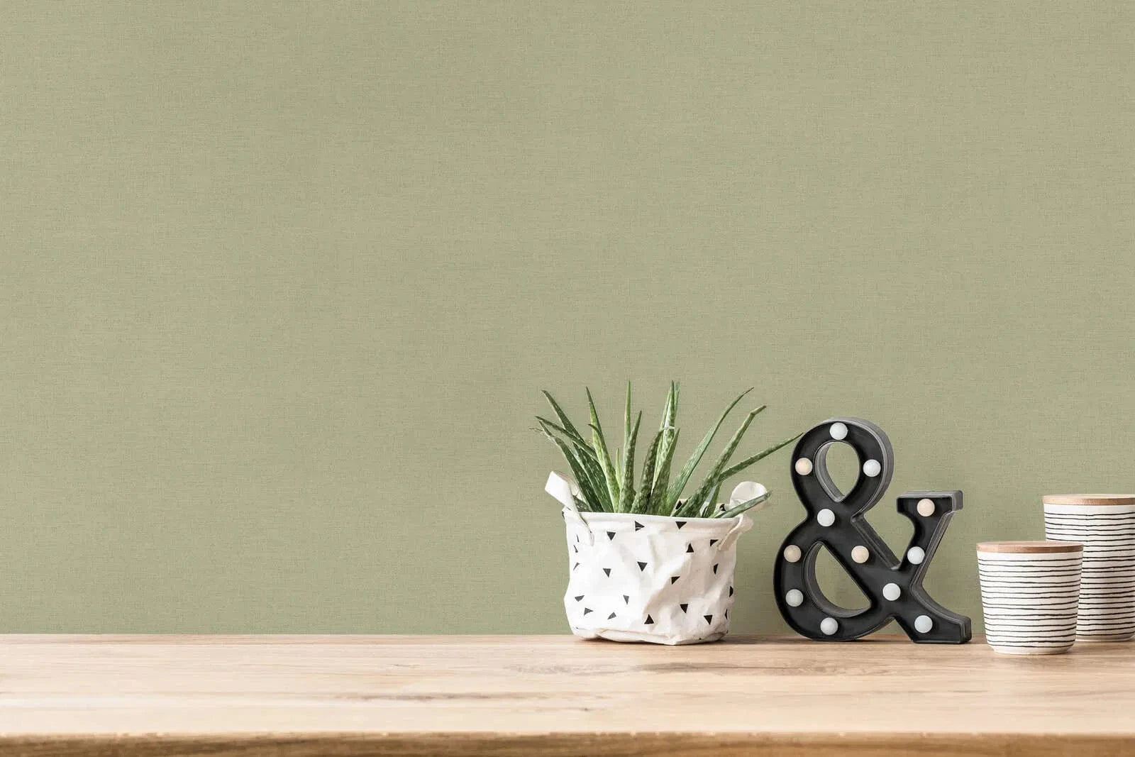 Tapetes ar tekstila reljefu maigi zaļos toņos AS 371788 AS Creation