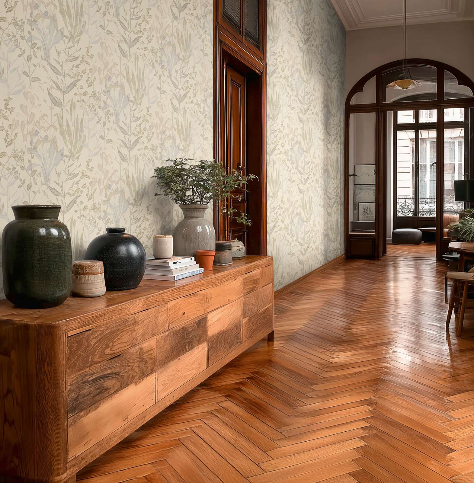 Cream botanical-style wallpaper with delicate leaves in a harmonious living room. SKU: 3007113, AS Creation.