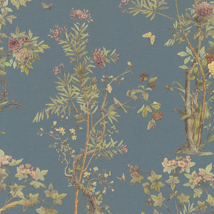 Dark blue wallpaper with a drawing of blooming trees, birds, and butterflies, close-up