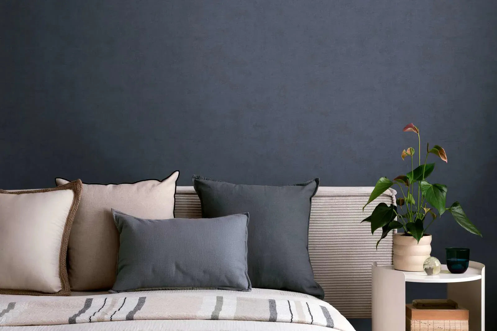 Blue wallpaper with light texture and matt finish for a modern living room. SKU: 3011750, AS Creation.