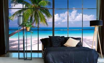 Fototapetes - Skats uz tropisko pludmali no loga D-ART